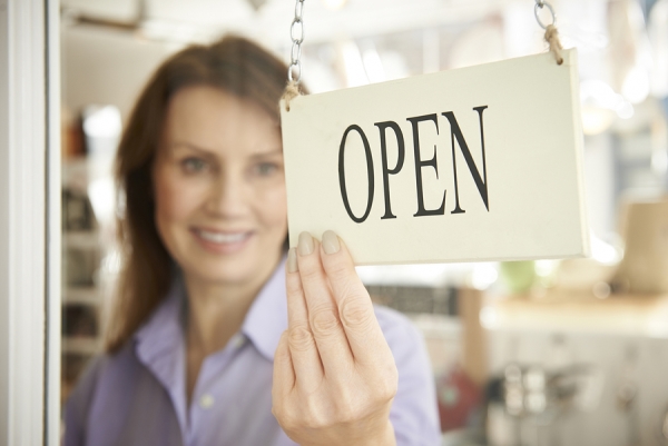 Woman opening the store